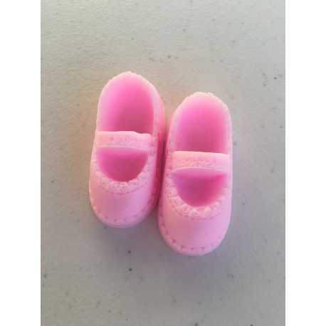 DETALLES DE DOS ZAPATITOS