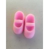 DETALLES DE DOS ZAPATITOS